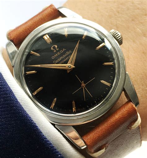 omega seamaster 600 vintage black dial|vintage omega seamaster automatic date.